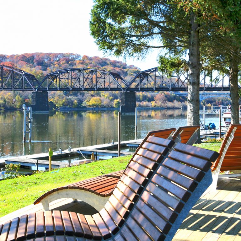 ARP Promenade River View Warm Day A view of seating at Allegheny RiverTrail Park's promenade area.